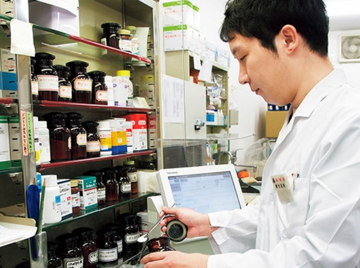 写真：管理薬剤師　樽本 昌典